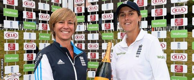 Jenny Gunn is awarded the player of the match champagne by England head of women's cricket Clare Connor