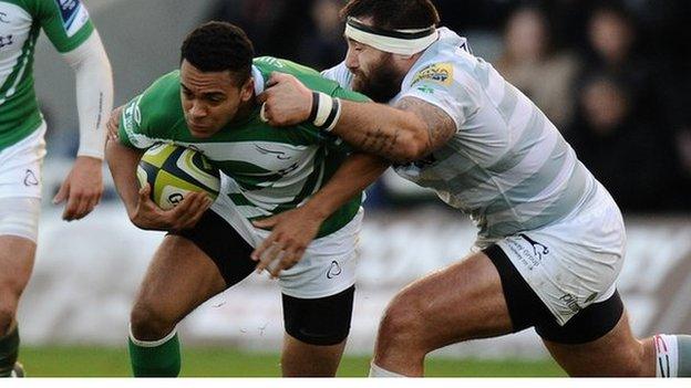 Zach Kibirige is tackled by Matt Parr of London Irish during the LV= Cup match between Newcastle Falcons and London Irish at Kingston Park