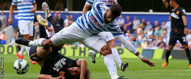 Armand Traore tackles Nikica Jelavic