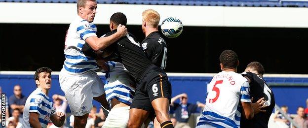 James Chester (right) scores for Hull