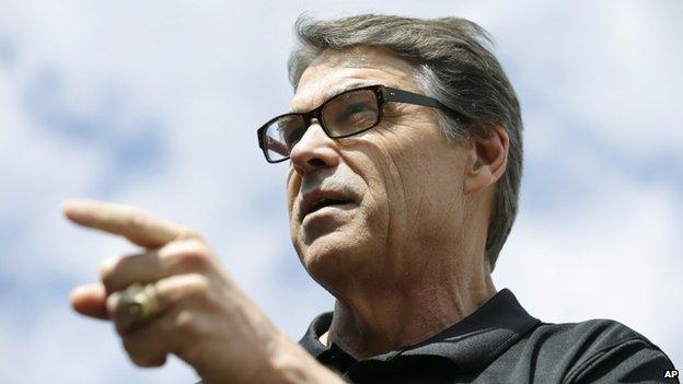 Texas Governor Rick Perry speaks at the Des Moines Register's Political Soapbox at the Iowa State Fair, on 12 August 2014, in Des Moines, Iowa.