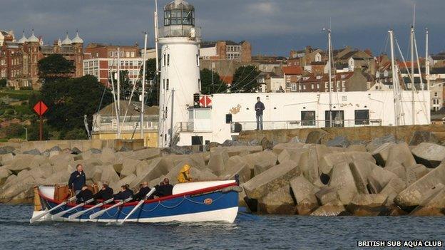 People rowing a lifeboat along North Yorkshire coast