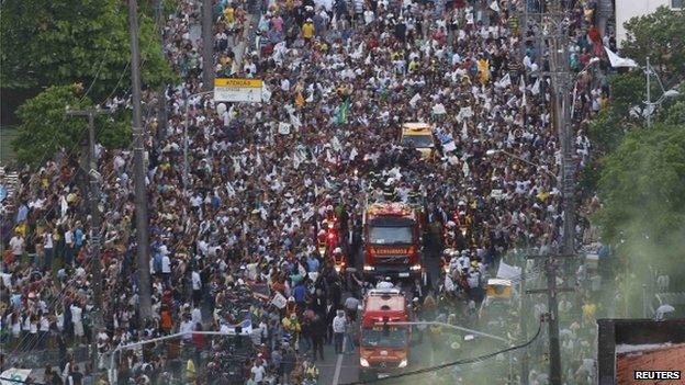 Procession to local cemetery for burial in Recife