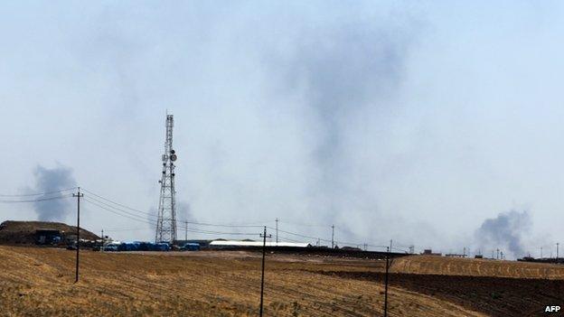 Smoke rises from the direction of Mosul dam, Iraq, 17 August