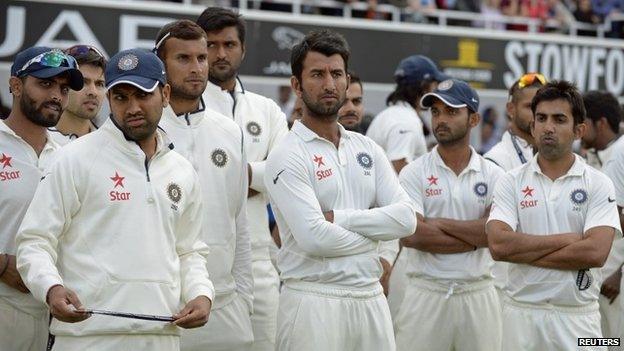 India's players look on during the presentations after losing the fifth cricket test match and the series against England at the Oval cricket ground in London August 17, 2014