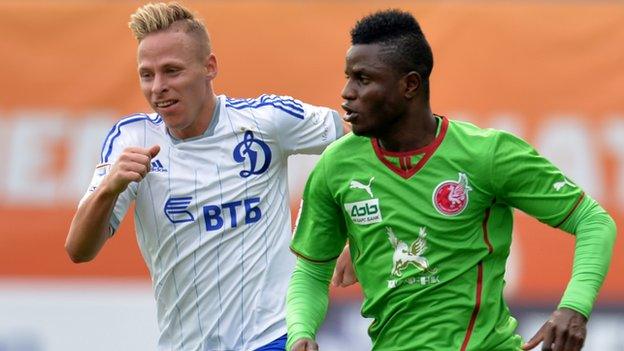 Rubin Kazan winger Mubarak Wakaso (right)