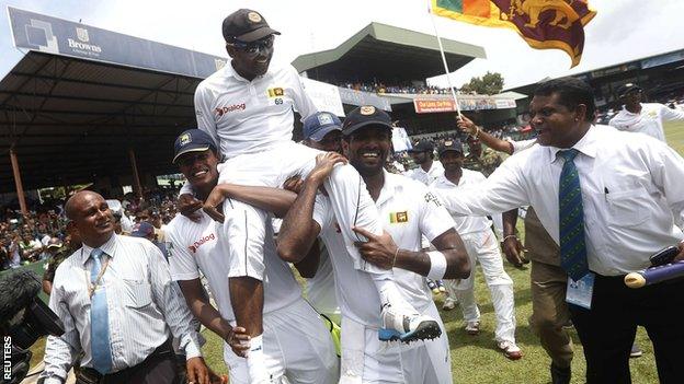 Sri Lanka's Mahela Jayawardene is carried off after his final Test