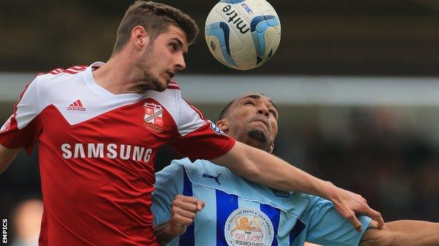 Jack Stephens playing for Swindon Town