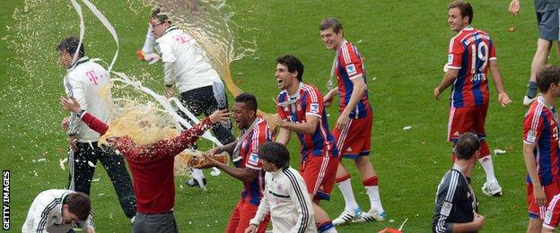 Bayern players soak Pep Guardiola with beer