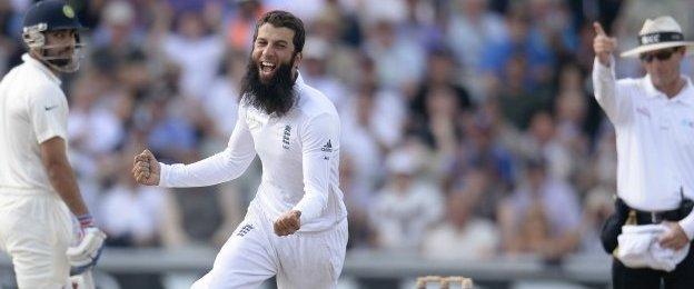 England"s Moeen Ali (C) celebrates after dismissing India"s Cheteshwar Pujara (not pictured) during the fourth cricket test match at Old Trafford cricket ground in Manchester, England August 9, 2014.