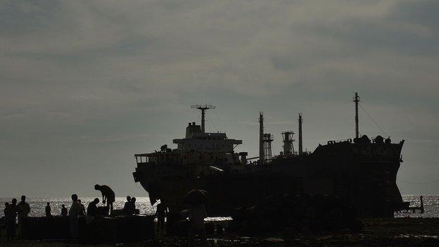 A ship is dismantled for scrap in the port city of Chittagong, Bangladesh