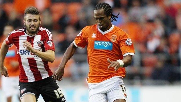 Brentford's match-winner Stuart Dallas and Blackpool goalscorer Nathan Delfouneso