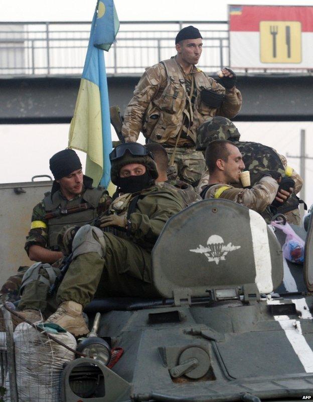 Ukrainian paratroopers pass through Druzhkivka, Donetsk region, 19 August