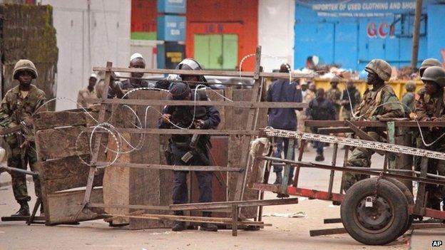 Liberia security forces block a road