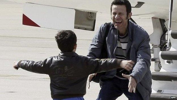 Spanish journalist Javier Espinosa is reunited with his son after six-month capture in Syria