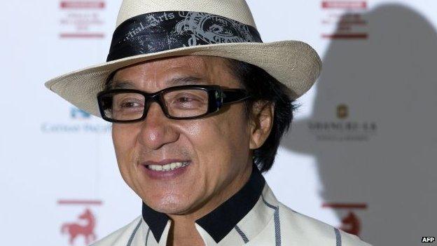 Hong Kong actor Jackie Chan poses for photographers at a special screening of his film, Chinese Zodiac, in central London, 12 August 2014