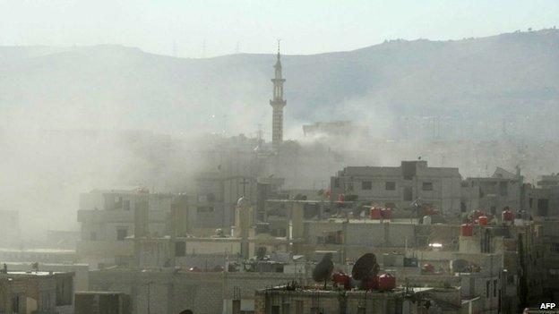 Smoke above buildings in the eastern Damascus Ghouta after the 21 August chemical weapons attack