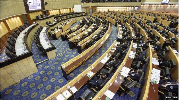 National Legislative Assembly members attend during a parliamentary session at parliament house in Bangkok 21 August 2014.