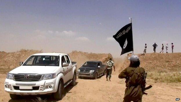 Islamic State militants on the Iraq/Syria border (file pic June 2014)