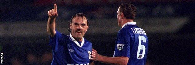 John Wark celebrates