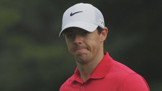 Rory McIlroy shows his frustration after a bad drive at the 12th