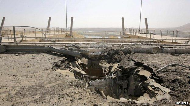 A crater seen at the entrance of Mosul Dam, 21 August 2014