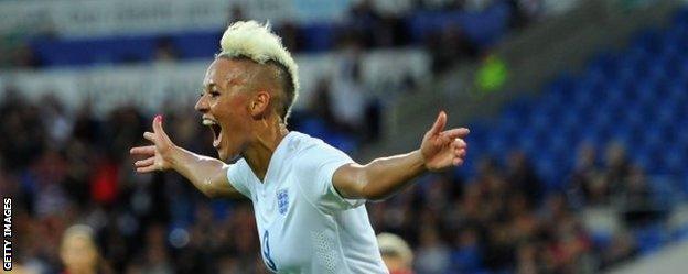 Lianne Sanderson celebrates