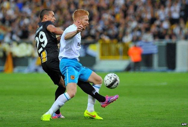 Lokeren's Nill De Pauw (left) and Hull City's Paul McShane