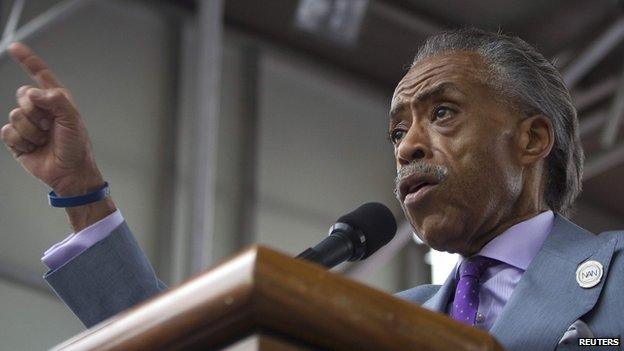 Reverend Al Sharpton speaks on stage as he takes part in the "We Will Not Go Back" march and rally for Eric Garner in the Staten Island borough of New York (23 August 2014)