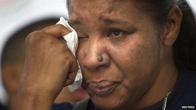 Esaw Garner, Eric Garner's widow, cries on stage as she takes part in the "We Will Not Go Back" march and rally in the Staten Island borough of New York August (23 August 2014)