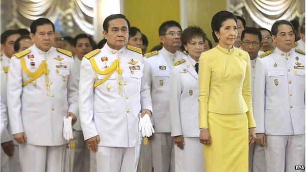 A handout photo made available by the Thai government shows Thai military junta head and newly appointed Prime Minister General Prayuth Chan-ocha with his wife Naraporn during a ceremony where he receives the royal command at the Army headquarters in Bangkok, Thailand, 25 August 2014.