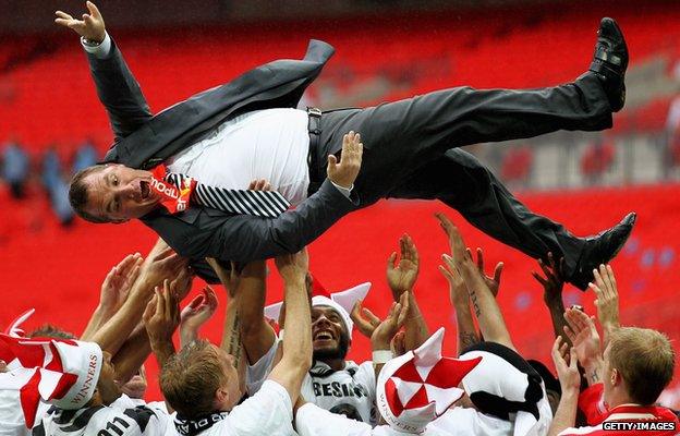 Swansea City celebrate winning promotion in 2011