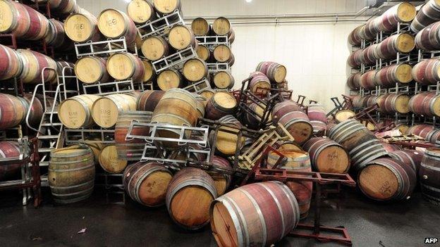 Barrels are strewn about inside the storage room of Bouchaine Vineyards in Napa, California after a 6.1 Earthquake struck the area on 24 August 2014