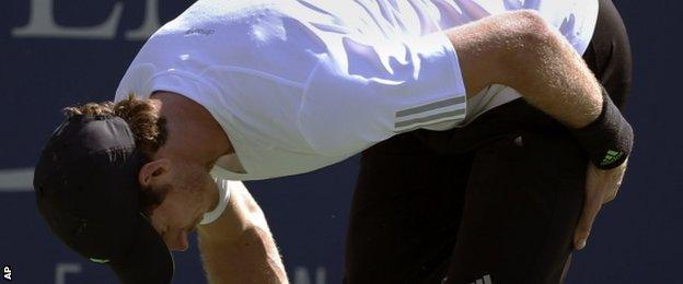 Andy Murray stretches his left leg during his win over Robin Haase