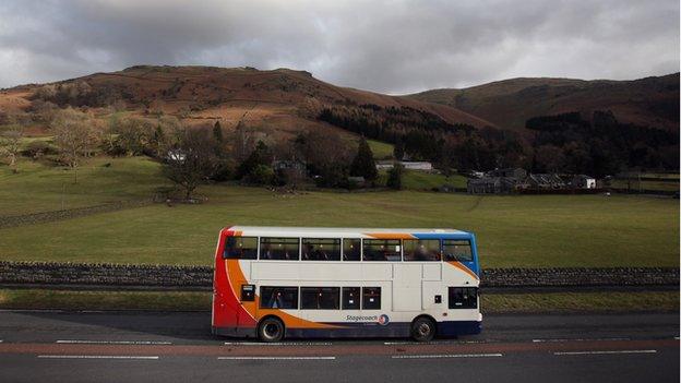 Bus drives through Lake District