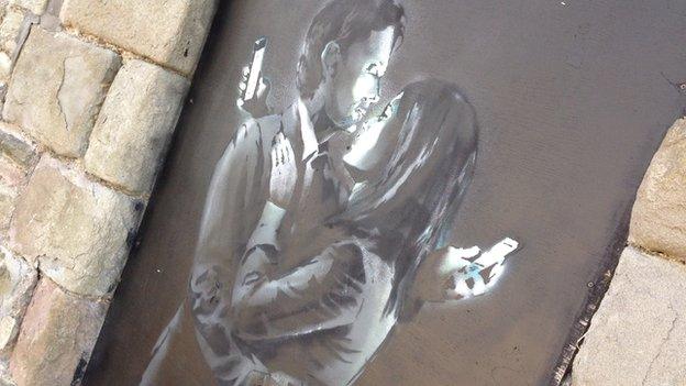 Banksy's Mobile Lovers