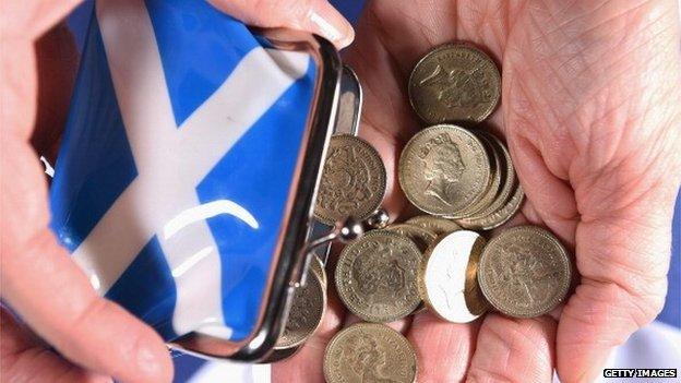 Scottish purse tipping out money