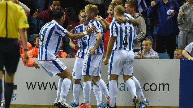 Kilmarnock's Rory McKenzie (centre) celebrates with team-mates having put his side 1-0 up against Ayr United.