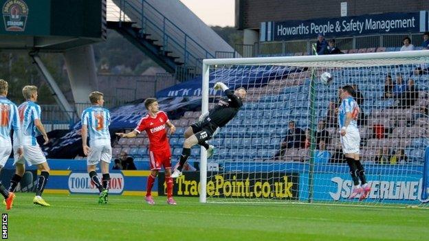 Huddersfield Town's Adam Hammill makes a goal line clearance