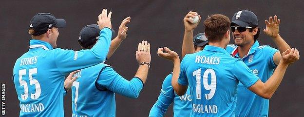 England celebrate a wicket