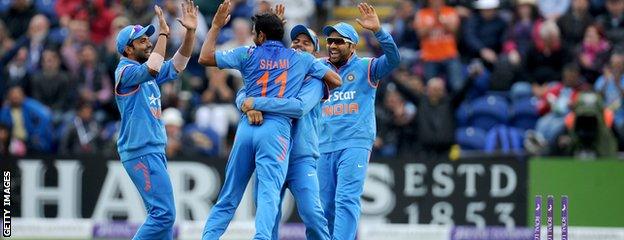 India celebrate a wicket