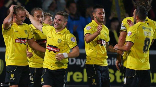 Burton players celebrate