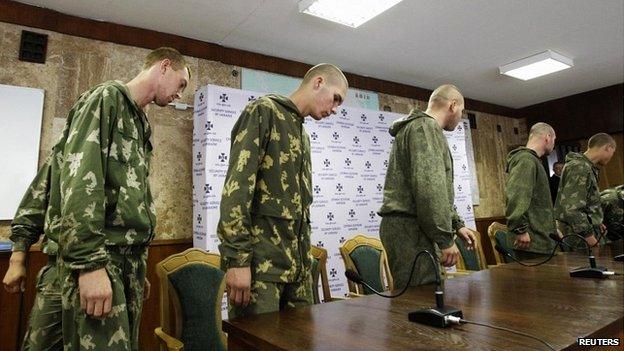 A group of Russian servicemen, who are detained by Ukrainian authorities, arrive at a news conference in Kiev - 27 August 2014