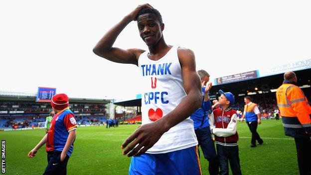 Wilfried Zaha with T-shirt thanking Crystal Palace