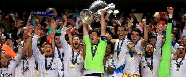 Real Madrid players lift trophy