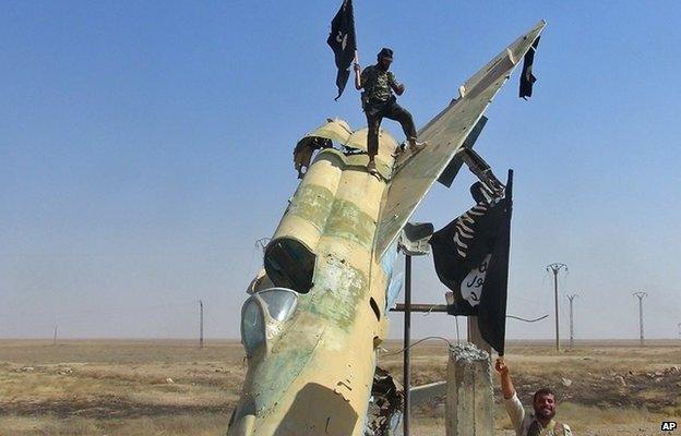 Photo posted by opposition Raqqa Media Center purportedly showing Islamic State fighters at Tabqa airbase (27 August 2014)