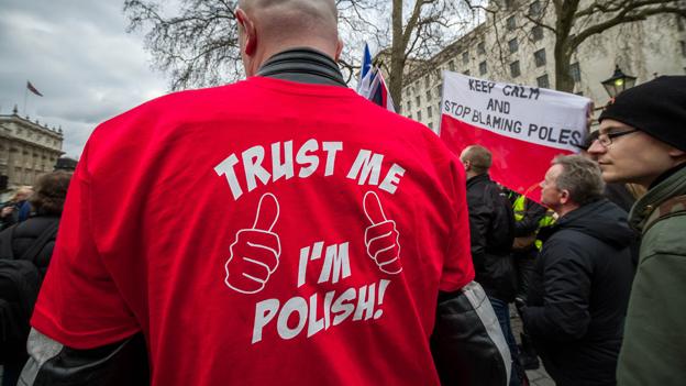 Man in shirt saying "Trust me I'm Polish"