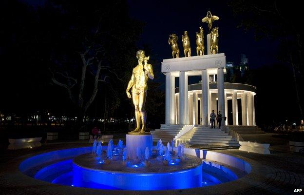 Golden statue by night