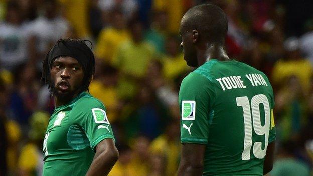 Ivory Coasts's Gervinho and Yaya Toure