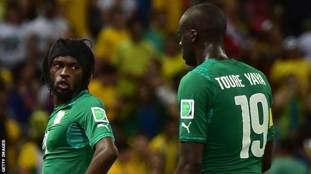 Ivory Coasts's Gervinho and Yaya Toure